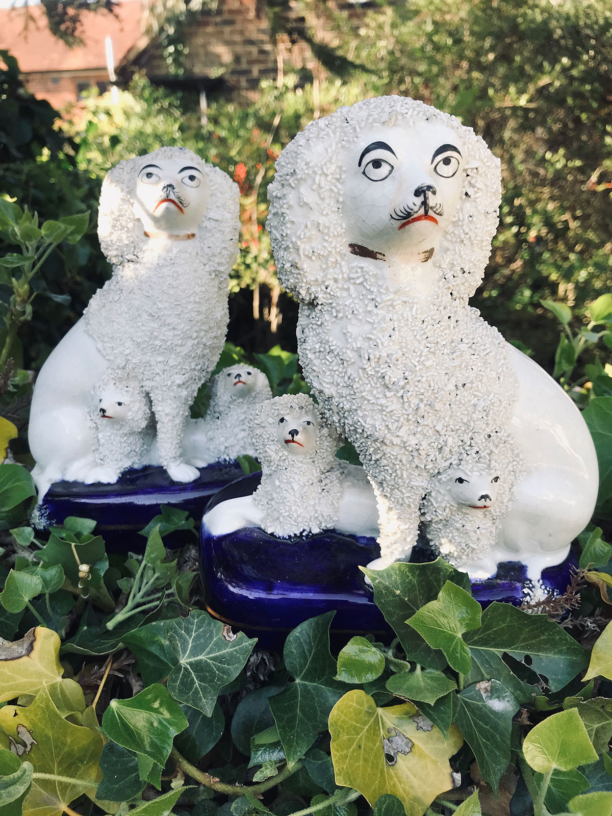 Pair of Early Victorian Staffordshire Poodles with Puppies